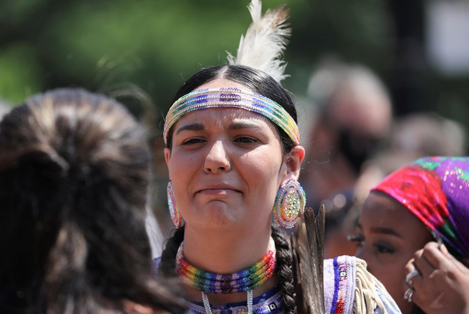 A protester takes part in a march from the Ontario provincial legislature in Toronto, Ontario, June 6, after the remains of 215 children were found on the grounds of the Kamloops Indian Residential School in May. For years Indigenous people in Canada have wanted an apology from the pope for the church's role in abuse at Catholic-run residential schools. (CNS/Reuters/Chris Helgren)