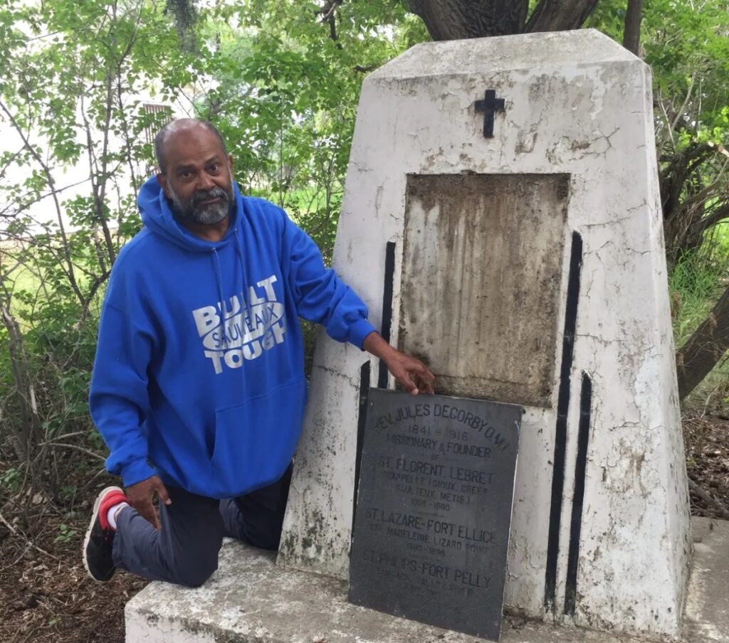 Joseph Kuruvilla, the parish priest at St. Philip's Roman Catholic Church, sought permission from the Archbishop of Regina to remove the plaque. (Submitted by Madeleine Whitehawk)