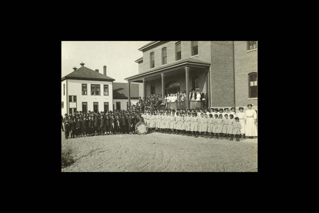 [Students and staff at Grand Junction Indian School in western Colorado in an undated photograph.Credit...Museums of Western Colorado]