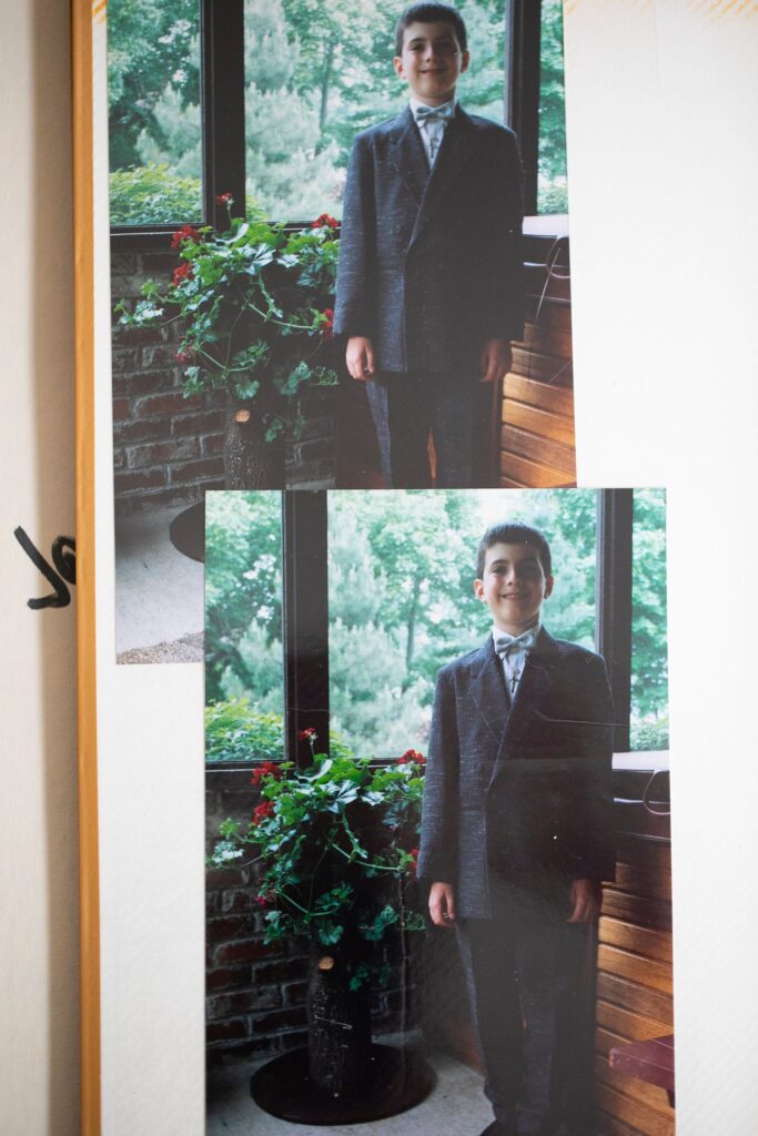 First communion photos of Chris Graham, now 39, who was raped by a priest in Columbus when he was 14-years-old. - COURTNEY HERGESHEIMER/COLUMBUS DISPATCH