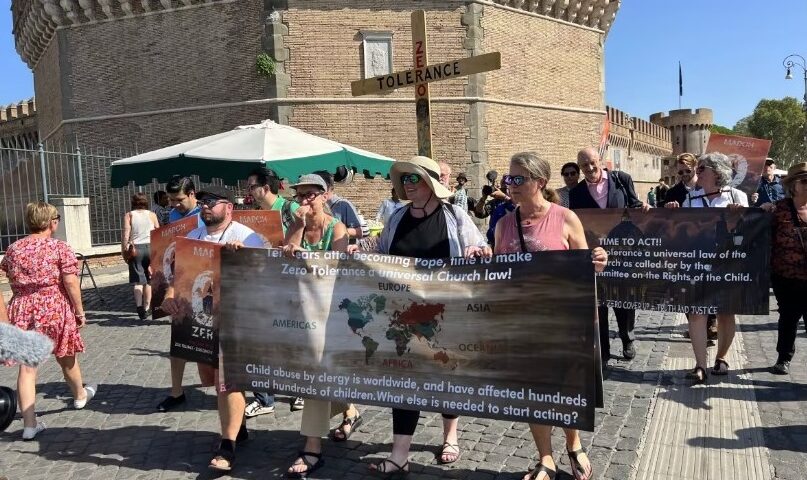 Survivors of clergy sex abuse from Canada and around the world [Ending Clergy Abuse ECA] are shown marching near the Vatican on Wednesday after a five-day pilgrimage to Rome. (Megan Williams/CBC)