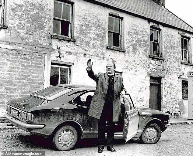 Bishop Eamon Casey outside his home in Firies near Killarney in 1974 with his car known locally as 'The Flyer'