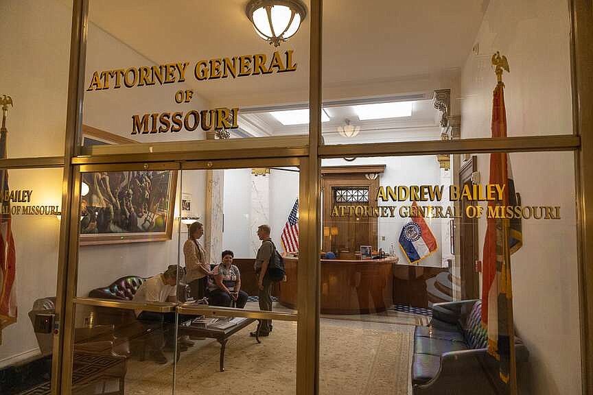 Cory W. MacNeil/News Tribune Activists wait Wednesday inside the Supreme Court of Missouri, hoping to speak to Missouri Attorney General Andrew Bailey to ask that he take the child abuse criminal case against Stephanie Householder to trial without offering her a plea deal.