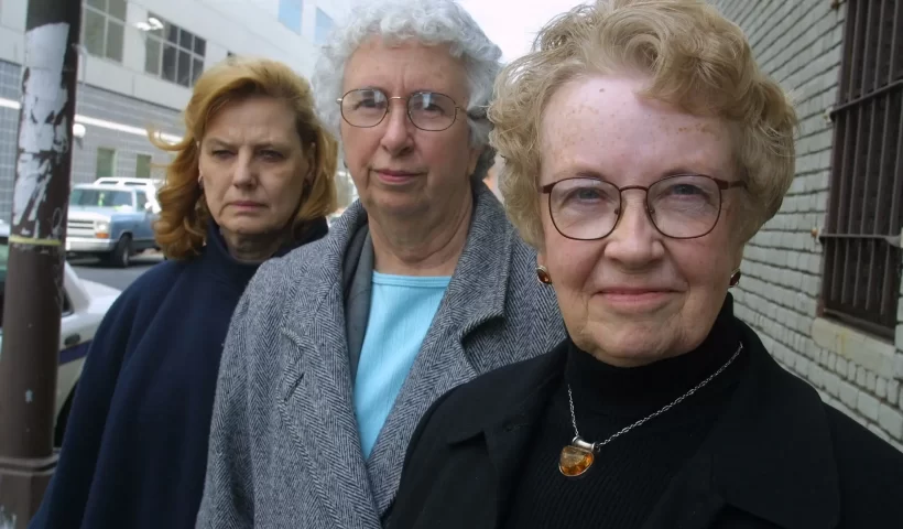 Sister Sally Butler, right, in 2002 with Sister Sheila Buhse, center, and Sister Georgianna Glose. The three of them worked to expose sexual abuse at a Roman Catholic church in Brooklyn.Credit...Nancy Siesel/The New York Times