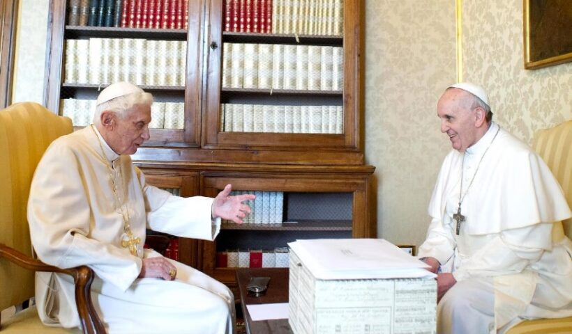 Francis (right) and Benedict at the papal summer residence with what is believed to be the box of scandal documents. Photograph: Vatican Pool